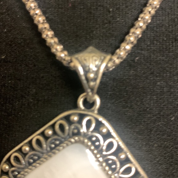 Necklace with a silver chain and white and silver accent piece - Picture 8 of 9